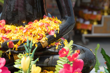 Buddha with flowers that lap