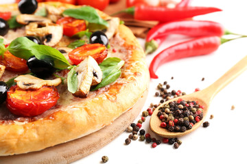 Delicious tasty pizza with vegetables on light background