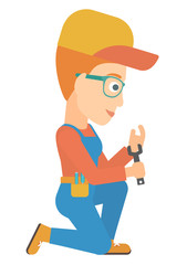 Repairer holding spanner.