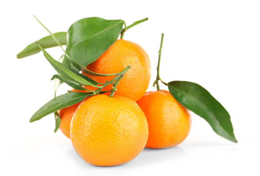 Oranges with green leaves, isolated on white