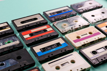 Obraz premium Set of old audio cassettes on blue background