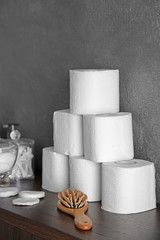 Bath accessories on grey wall background