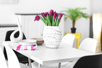 Beautiful comfortable modern interior with table and chairs