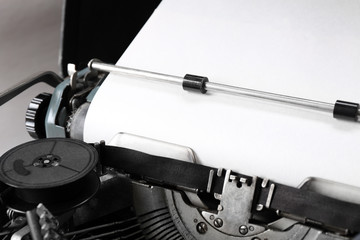 Old typewriter with paper, close up