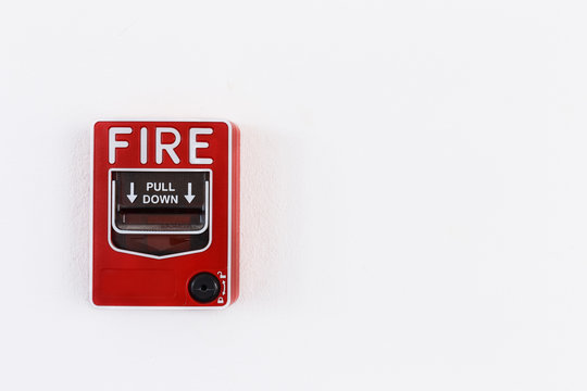 Fire alram pull switch on the white wall
