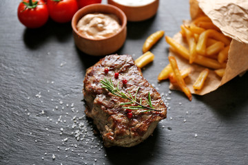Delicious grilled steak with fries