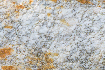 Surface of the marble with brown tint, stone texture and background. Imagination of the nature.