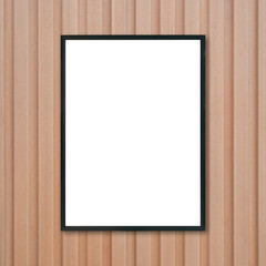 Mock up blank poster picture frame on wood wall.