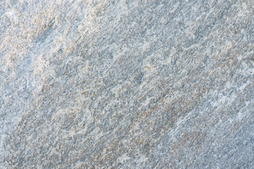 Surface of the marble with brown tint, stone texture and background. Imagination of the nature.