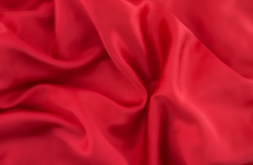 Red satin background. Photo texture. Top view