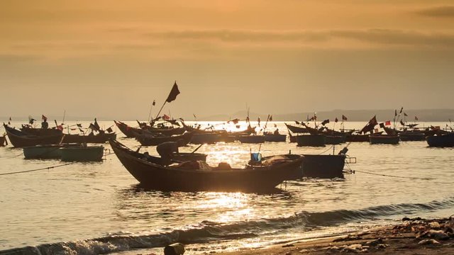 Fishing Boat Silhouettes in Sea Bay at Sunset in Vietnam