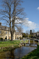 Stone bridge over River Eye, Lower Slaughter, Gloucestershire,