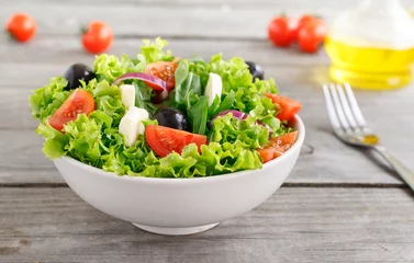 Tuinposter fresh vegetable salad with mozzarella © kucherav
