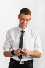 Naklejka premium portrait of young stylish businessman on gray background