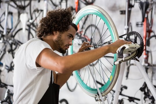 Worker repairing bicycles