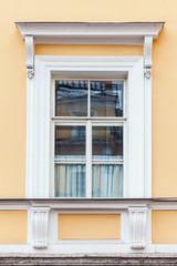 Classical architecture details, yellow wall and window