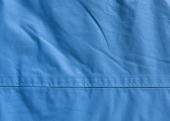 Naklejka premium Blue textile texture close-up.