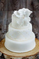 Wedding cake covered with white fondant