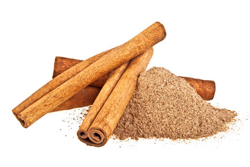 Cinnamon sticks and powder on white background