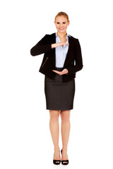 Business woman holding empty copy space between her hands