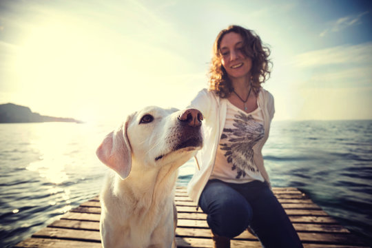 happy woman to have fun together with her dog