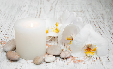 Candle, orcids and stones