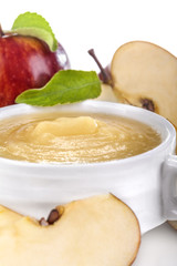 Apple puree of fresh organic apple on a white background