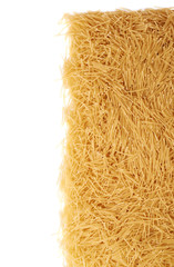 Pile of dry noodles pasta over isolated white background