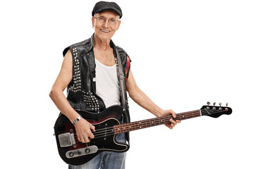 Senior punk holding a bass guitar