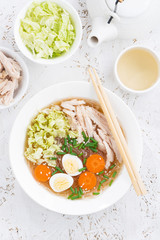 Chinese soup with glass noodles, top view vertical