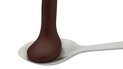 Chocolate poured on a metal spoon