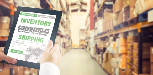 Composite image of man using tablet pc