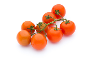 Tomato on the white isolatd background.