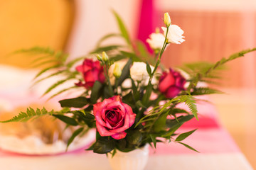 Floral decoration on festive table.