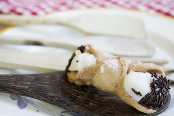 Sicilian cannolo filled with cream