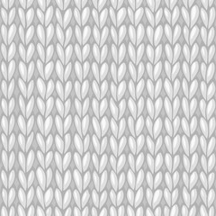 Vector white seamless knitted pattern.
