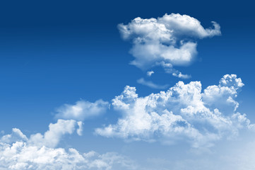 Naklejka na ściany i meble fluffy clouds on blue sky