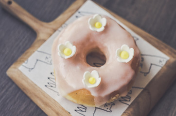 Donut daisy on wood