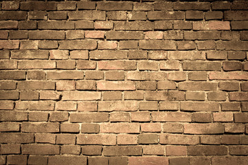 Obraz premium brown - orange retro brick wall - background texture