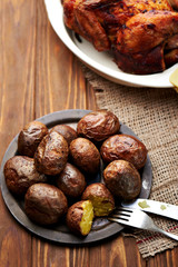 close up of a tray of rustic roasted baked potato