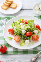 fresh salad on white plate