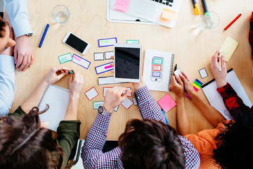 Designers, teamwork concept. People at office working on respons