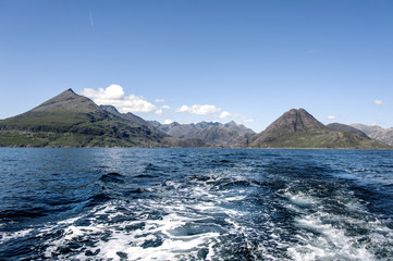 Fototapeta na wymiar Scotland, near Loch Coruisk, Elgol: Scenic Landscape with skyline of rocky mountains and waves of the Altantic Ocean