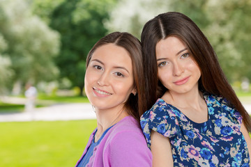 Obraz premium Young Adult Mixed Race Sisters/ Friends. Portrait