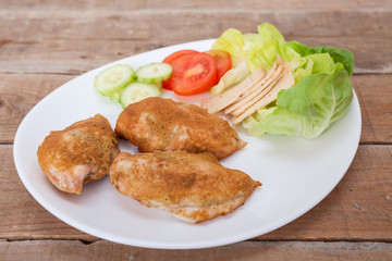 Roast chicken fillet and vegetables