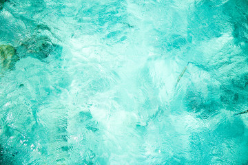 Surface of blue water reflecting the sun. The pacific ocean.