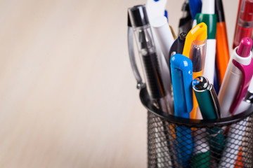 Metal holder with pens