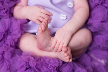 The feet of a newborn baby