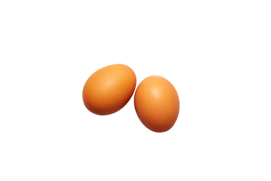 two fresh eggs on a white background