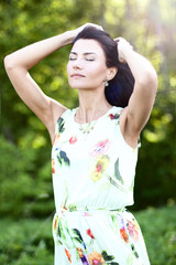 Naklejka premium Beautiful girl dress summer resting enjoying idea lifestyle, fashion concept, nature, portrait women park